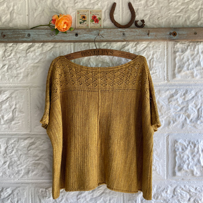 A yellow short sleeved summer top