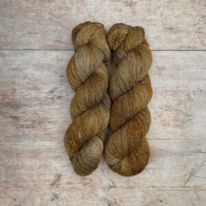 skeins of merino and linen in cafe au lait, gold and grey