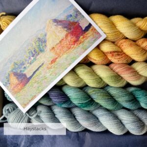 Five mini skeins of wool and the painting that inspired them