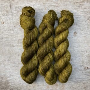 Three skeins of Mohair Sock in a yellow green khaki