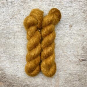 Two skeins of Mohair and silk lace in a deep rich gold