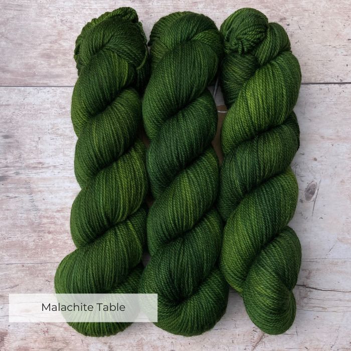 Three skeins of Plump in an emerald green