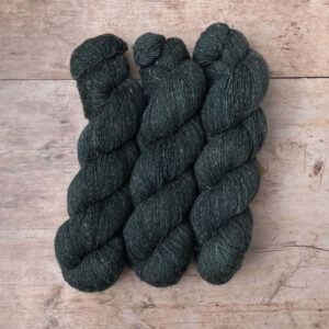 Three skeins of Flax in dark stormy blue