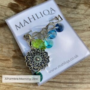 A removable marker with five crystal markers in Lime,turqoise and greens