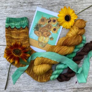 A print of Van Gogh's Sunflowers with a full skein and two minis to match with a silk ribbon