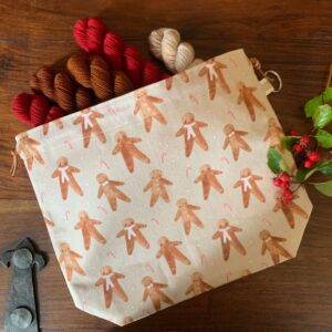 gingerbread man themed workbag with yarn